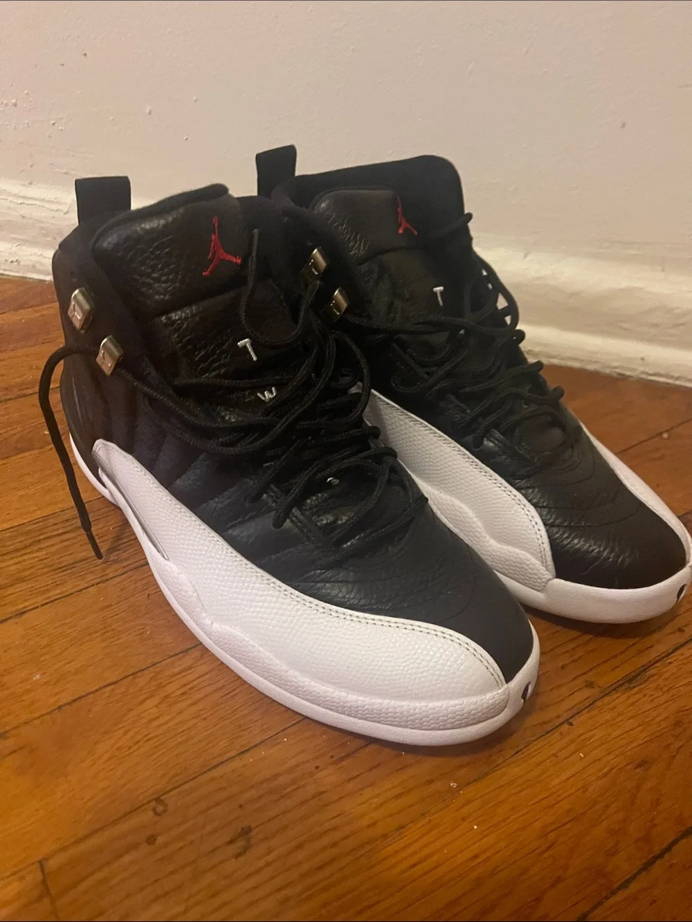 Jordan Retro High Top Sneakers in Black, White & Red Accents